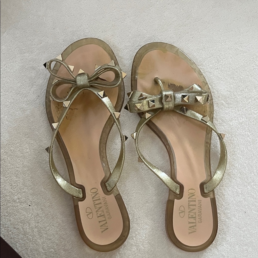 Valentino Garavani Metallic Gold Stud Bow Thong Sandals